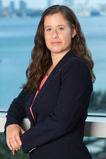 Professional portrait of Nyana Miller, LL Law Firm attorney, accompanying article about $22 million fraud judgment in favor of client.
