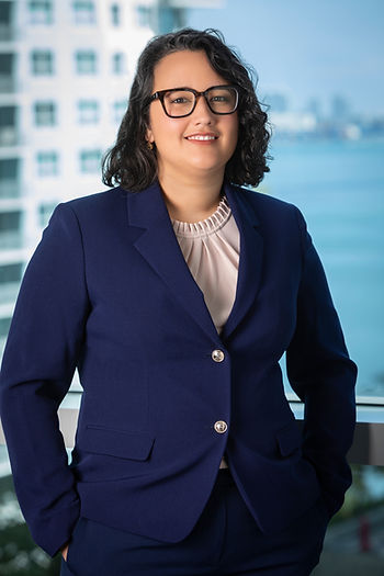 Jennifer Mosquera, LL Law Firm associate attorney, professional portrait in navy blazer