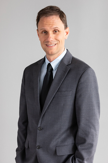 William Nichols, LL Law Firm Director of Investigations, professional headshot in dark suit