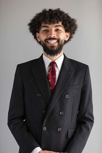 Alain M. Acanda, LL Law Firm attorney, professional headshot in pinstripe suit